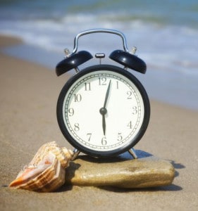 clock on beach-cropped